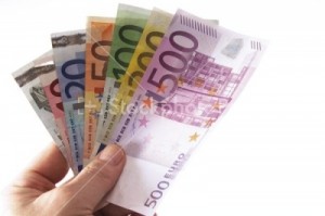 stockphotopro_75153TMH_hand_holding_euro